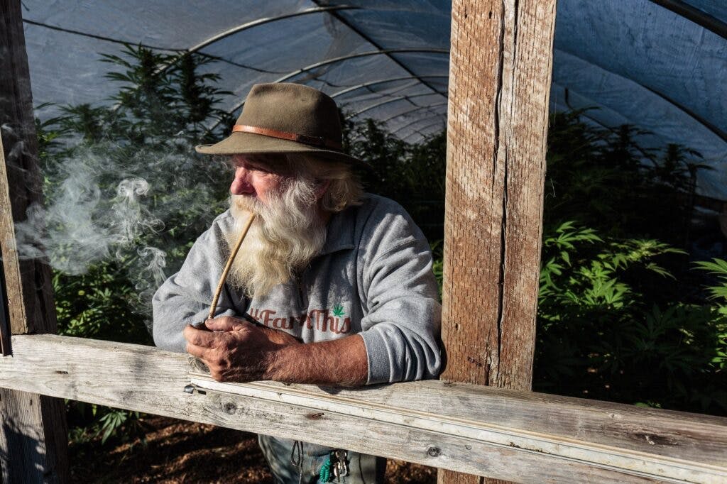 farmer-tom-lauerman-smoking-a-pipe-at-his-farm